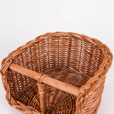 
                    
                      Wicker Bike Seat for Dolls, close-up interior view of natural brown woven wicker, highlighting the intricate basket weave.
                    
                  