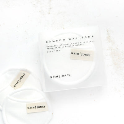 
                    
                      Nash and Jones Bamboo Washpads set, white reusable facial pads in clear packaging, with loose pads displaying brand label.
                    
                  