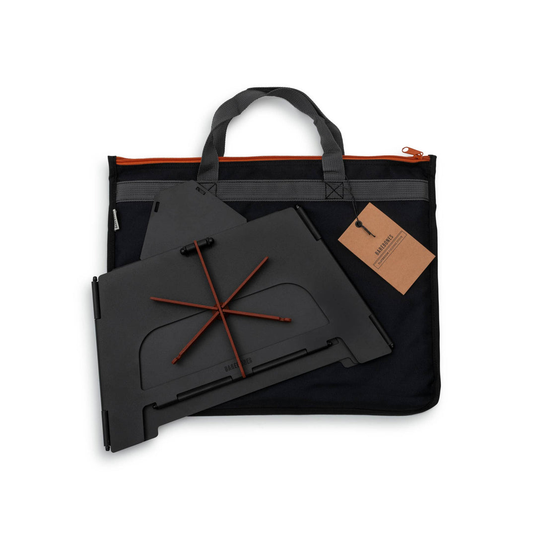 Barebones Flatbrook Folding Stove, dark grey components disassembled and secured with orange elastic band, next to its black…