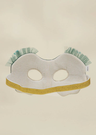 
                    
                      Fantastic Owl play mask, back view revealing inner striped polyester, gold elastic strap, and green ruffled top.
                    
                  