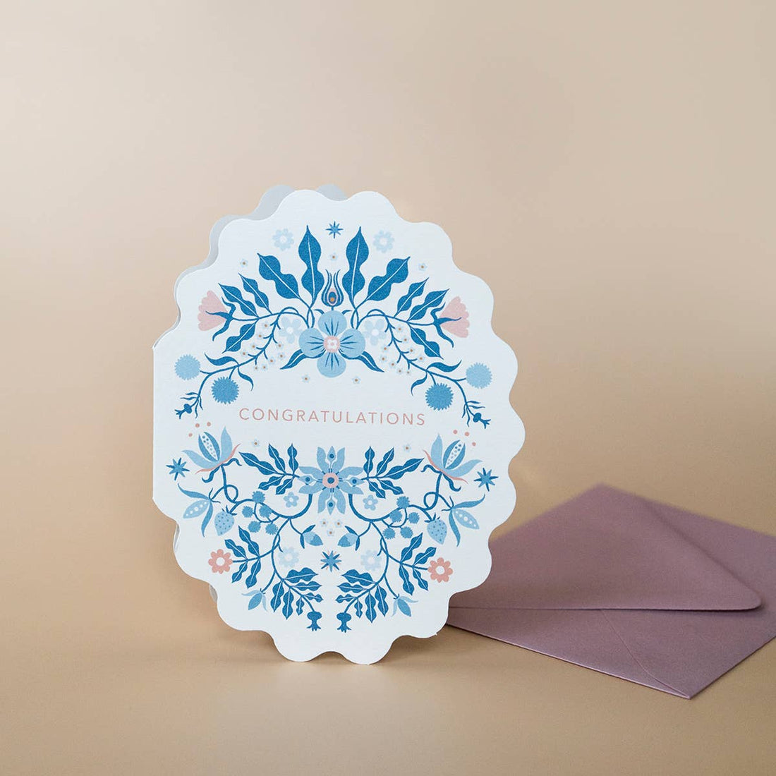 Folk Congratulations greeting card, scalloped edge, blue and pink folk floral design with 'Congratulations', standing with a…