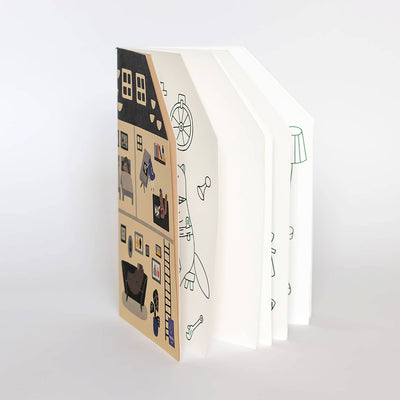 
                    
                      Jumbo House coloring book, open at an angle, showing illustrated house cover and white pages with line-art drawings.
                    
                  