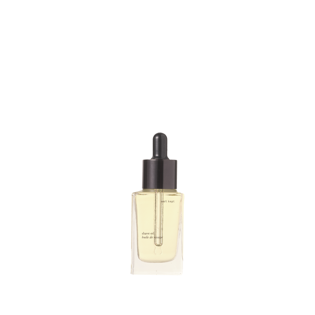 Well Kept Shave Oil in clear glass bottle, black dropper, pale yellow oil, front view showing dropper and label text.