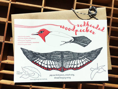 
                    
                      Woodpecker Pop-Out Die-Cut Card, white cotton paper, red & black bird illustration with assembly instructions, kraft…
                    
                  