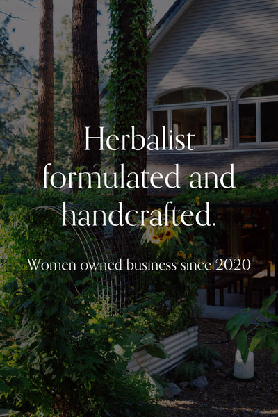 
                    
                      Growing Up Rooted's brand values: 'Herbalist formulated and handcrafted. Women owned business since 2020.' on a lush garden…
                    
                  