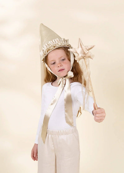 
                    
                      Gold Star play wand, shimmering gold fabric star and ribbons, held by child for scale, close-up showing use.
                    
                  