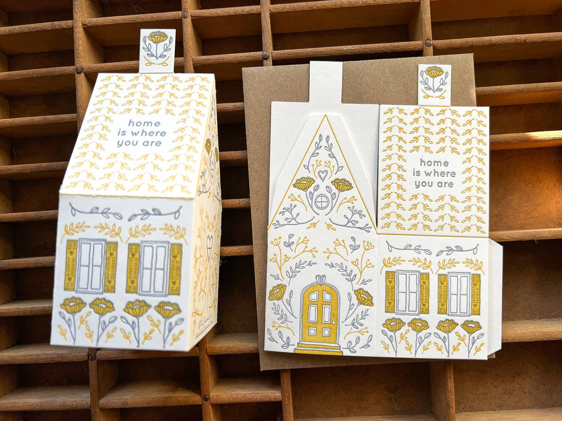 Home Is Where You Are 3D Die-Cut House Card, 118# cotton paper. Assembled house & unfolded flat view showing yellow/grey…