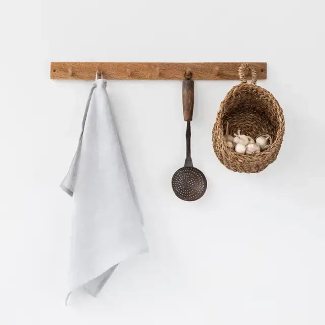 Premium Linen Tea Towels, light grey 100% linen, folded and hung on a wooden peg rail.