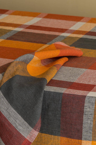 
                    
                      Eugene Classic Checks linen napkin, orange, rust, gray, and dark gray yarn-dyed European linen, close-up of folded fabric…
                    
                  