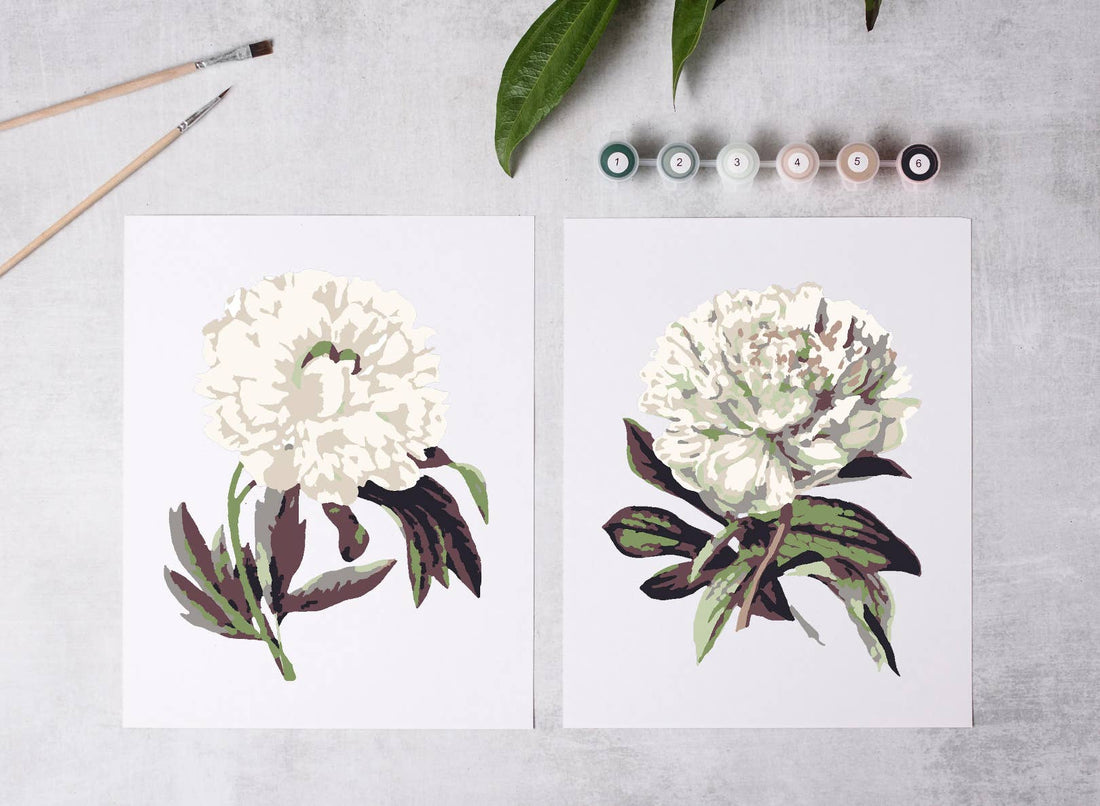 Cate Paper Co. Peony Blossoms Paint-by-Numbers Kit. Flat lay of unpainted canvas, completed green and cream peony art,…