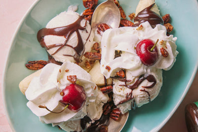 
                    
                      Peppermint Hot Fudge sauce drizzled generously over vanilla ice cream and whipped cream, topped with cherries and pecans.
                    
                  