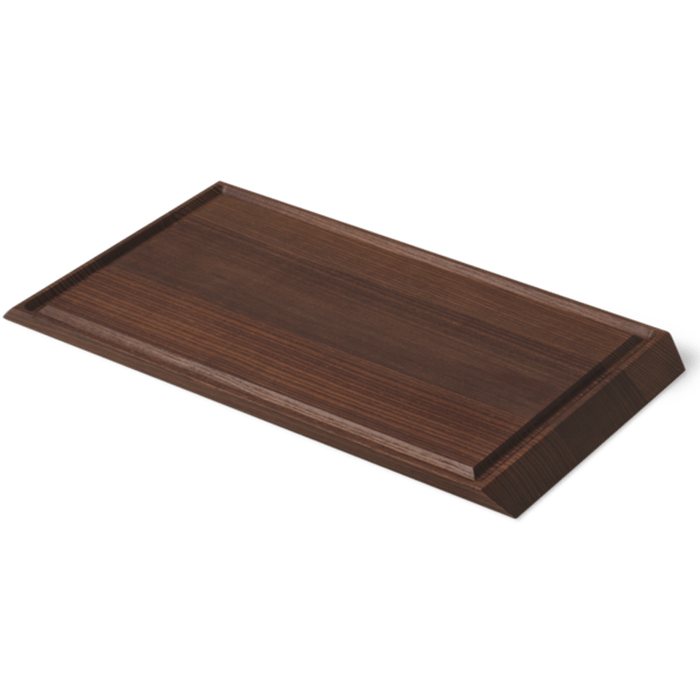 Rå Ash Wood serving tray, dark heat-treated ash wood with prominent grain, angled view of recessed groove, on white.