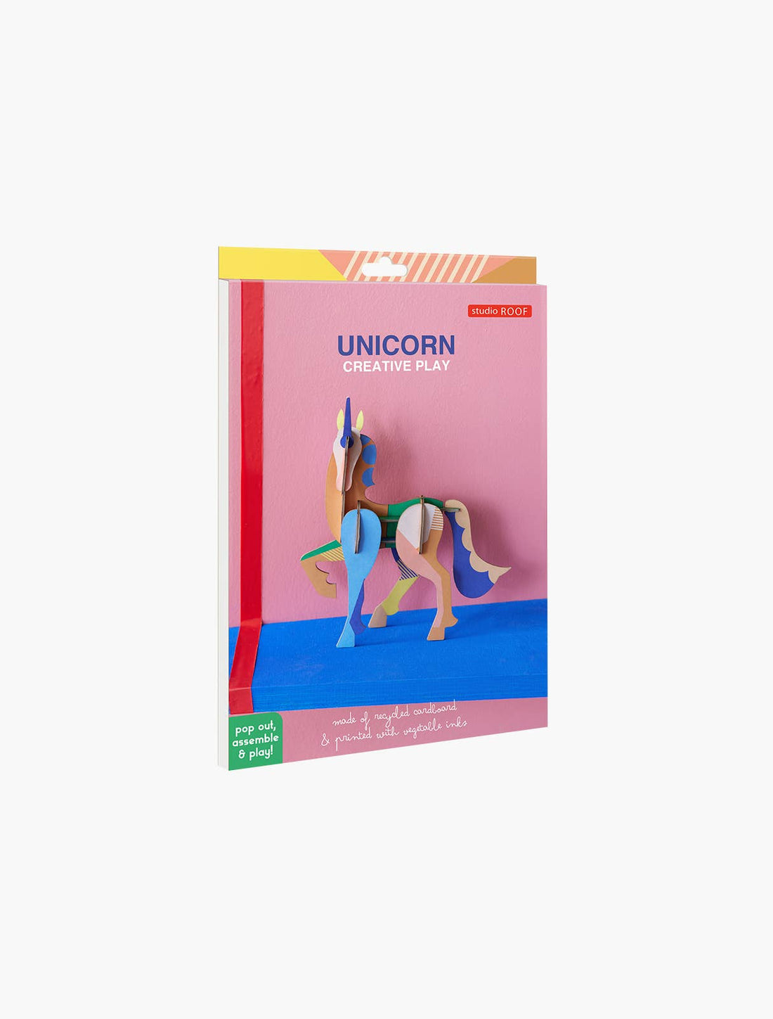 Studio Roof 3D Unicorn craft kit packaging, angled view showing colorful pop-out unicorn and visible details: recycled…