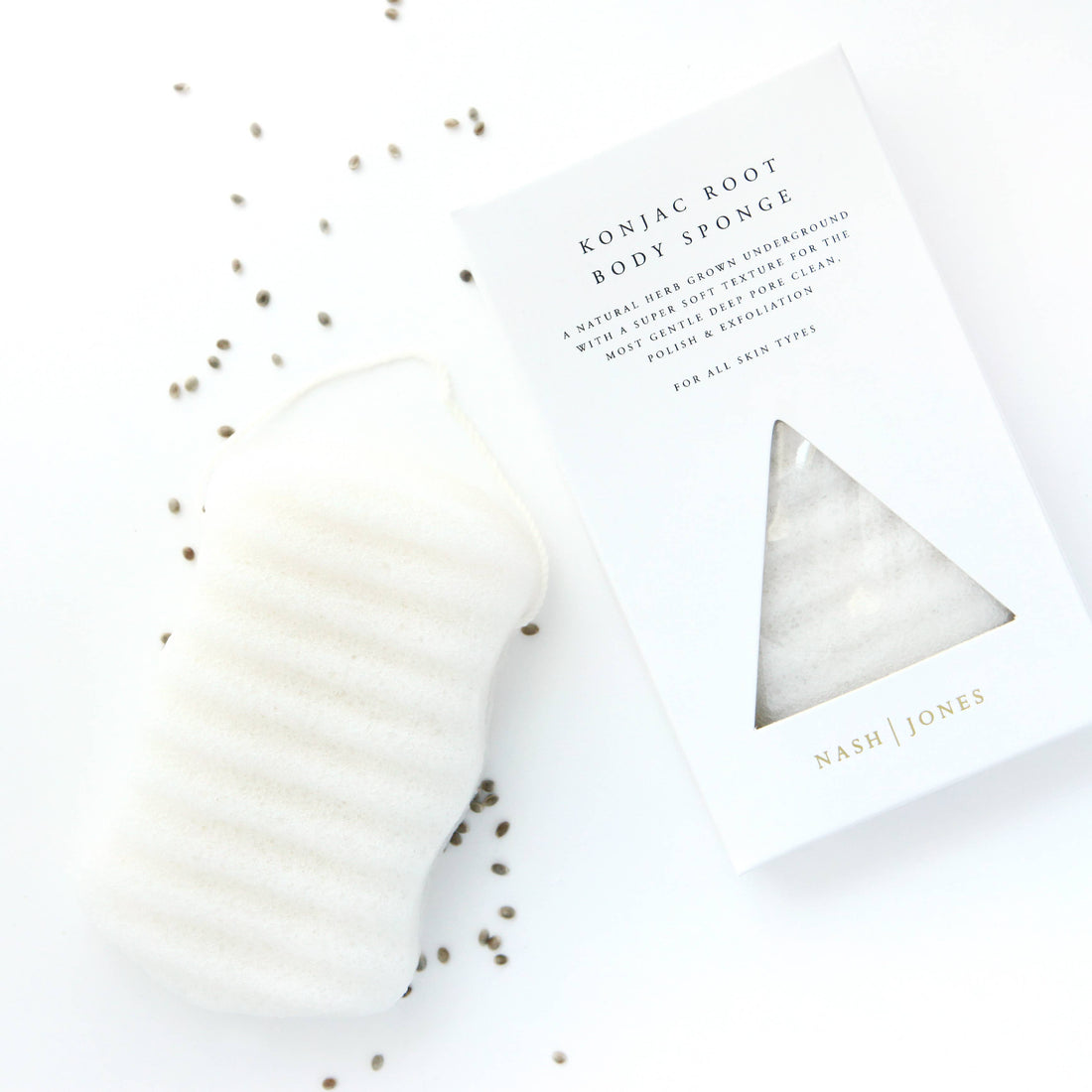 Nash and Jones Konjac Face Exfoliation Sponge, white ridged Konjac, laid flat with packaging box showing triangular window.
