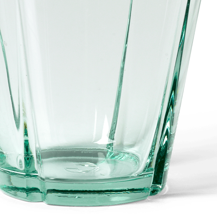 Grand Cru recycled glass tumbler, close-up detail of faceted base and subtle green hue.