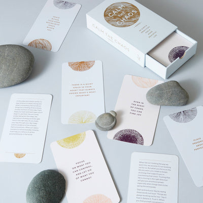 
                    
                      Calm The Chaos Cards mindfulness card deck, flat lay, box open with cards spread out, showing colorful patterns and text on…
                    
                  