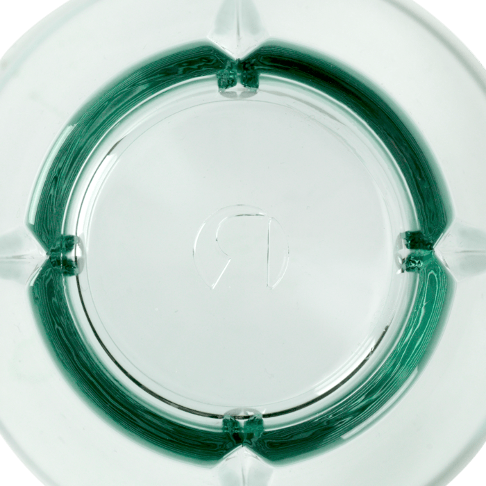 Grand Cru recycled glass tumbler, close-up of bottom interior showing green tint and distinctive circular texture.