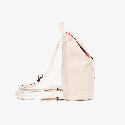 
                    
                      Kaut Mini Ecru mini backpack, side view of recycled RPET fabric, showing top opening zipper and adjustable cotton straps.
                    
                  