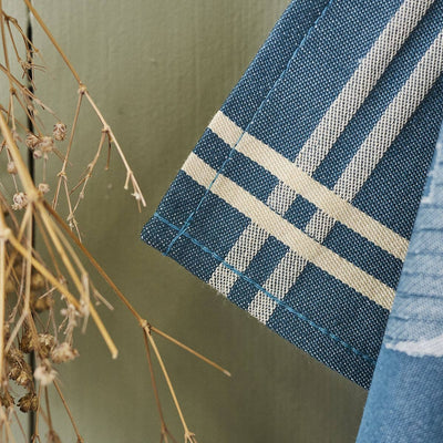 
                    
                      Sylvie Thiriez Torchon Jacquard Coeur Vallée tea towel, close-up of blue cotton weave with beige striped pattern and…
                    
                  
