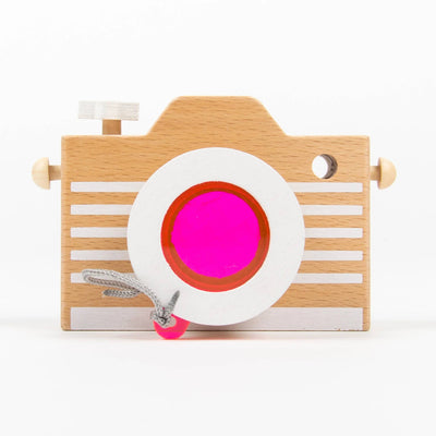 
                    
                      kiko+ & gg* Kaleidoscope Play Camera, natural beechwood toy with white stripes, magenta acrylic lens, grey cord, pink bead,…
                    
                  