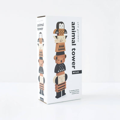 
                    
                      Animal Stacking Tower toy packaging box, natural wood and black animal block illustration, angled view on white.
                    
                  
