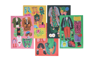 
                    
                      Fearless Fashion magnetic doll set, an overlapping collage of diverse paper outfits and accessories with vivid patterns.
                    
                  
