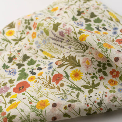 
                    
                      Botanist tea towel, close-up texture of 100% European linen with colorful wildflower pattern, folded view.
                    
                  
