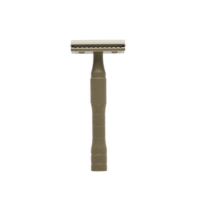 
                    
                      Kelp safety razor, brass in muted green hue, full front view with textured handle and blade guard detail.
                    
                  