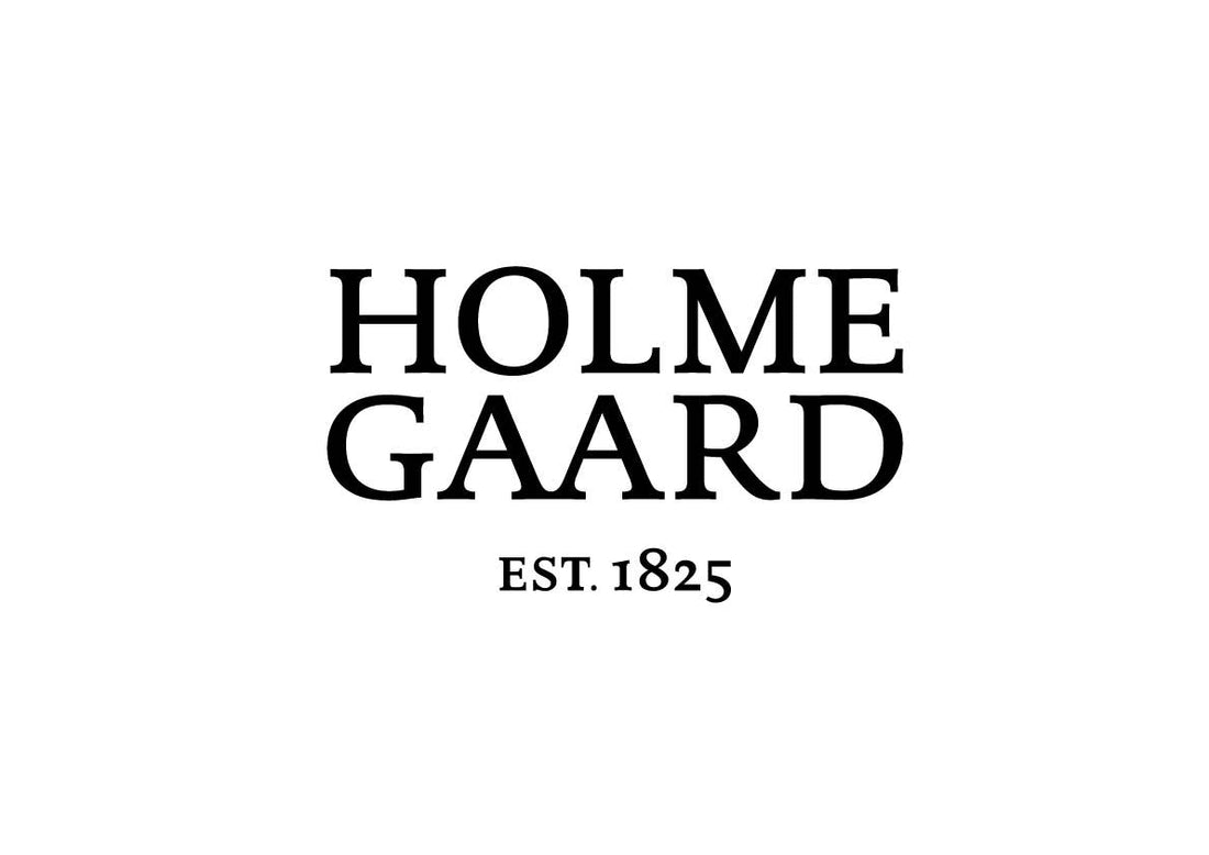 Holme Gaard brand logo, black serif text 'HOLME GAARD EST. 1825' on a clean white background.