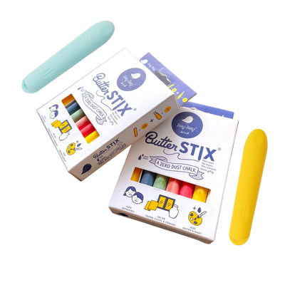 
                    
                      Jaq Jaq Bird Butterstix dustless chalk, two 12-piece white boxes displaying multi-colored sticks, with light blue and yellow…
                    
                  