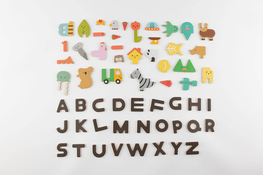 Magnetic Alphabet Play Set, full set of colorful composite shapes and dark brown letters, arranged flat lay on white surface.