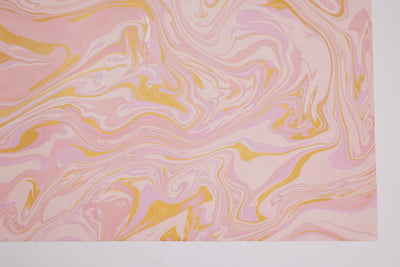 
                    
                      Free Spirit Marshmallow hand marbled wrapping paper, detailed close-up of pink and gold swirling pattern on handmade…
                    
                  
