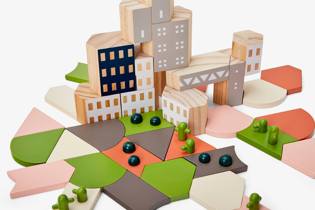 Blockitecture Desert Garden building blocks: assembled pine city, colorful landscape with cacti and spheres, high angle.