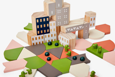 
                    
                      Blockitecture Desert Garden building blocks: assembled pine city, colorful landscape with cacti and spheres, high angle.
                    
                  