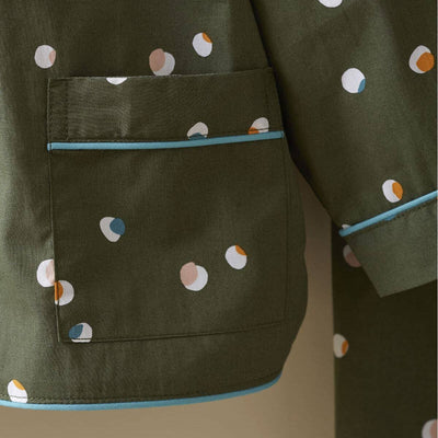 
                    
                      Kids Confetti Pajamas, olive green cotton with multicolor confetti dots, close-up of chest pocket, hem, and sleeve with…
                    
                  
