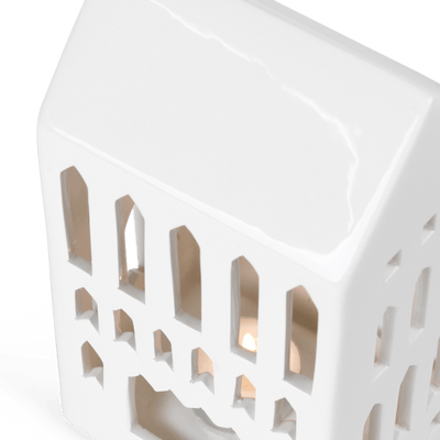 
                    
                      Urbania Ceramic Lighthouse candle holder - Church, white dolomite ceramic, angled close-up showing interior light.
                    
                  
