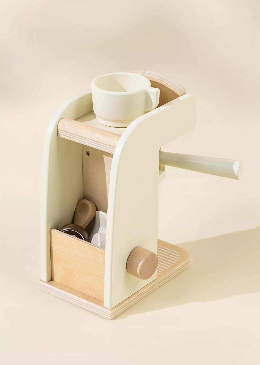 Wooden Coffee Maker Set play kitchen toy, light cream and natural pine wood, 3/4 front view showing the coffee mug and scoop.