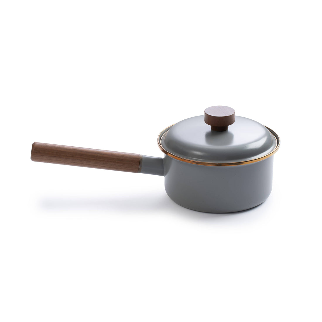 Barebones Enamel Saucepan with Walnut Handle, gray enamel with gold trim, angled view on white background.