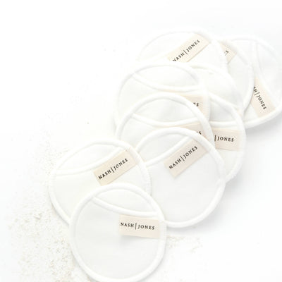 
                    
                      Nash and Jones Bamboo and Cotton Reusable Facial Pads, white, arranged diagonally in a flat lay on a white surface.
                    
                  