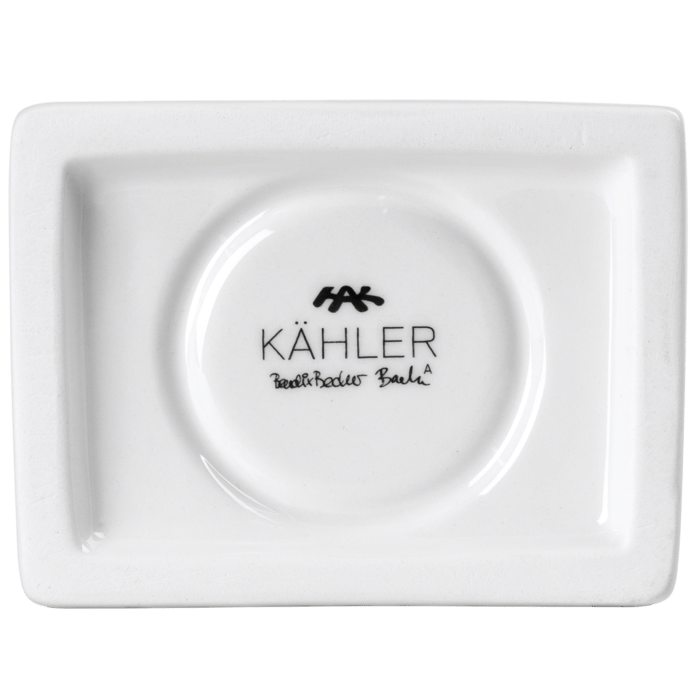 Urbania Church ceramic candle holder, white Dolomite, bottom view highlighting KÄHLER brand stamp and designer's signature.