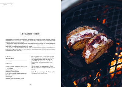 
                    
                      Food Over the Campfire print book, S'mores French Toast recipe page with image of the dessert cooking over a campfire grill.
                    
                  