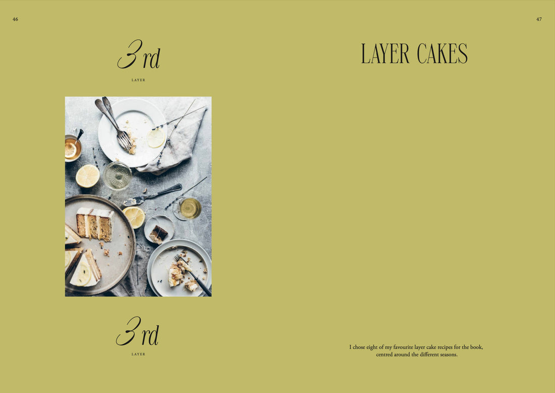 Queen of the Cakes book, interior page showing gluten-free layer cake slices with lemon and tea on a rustic grey surface.