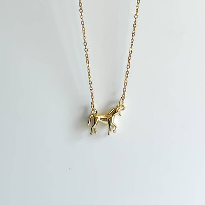 
                    
                      Horse Girl Necklace, gold-plated brass horse pendant and gold stainless steel chain, centered on white.
                    
                  