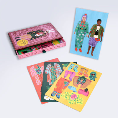 
                    
                      Fearless Fashion Magnetic Dolls set, flat lay showing pink box, two paper dolls, and colorful magnetic clothing pieces.
                    
                  