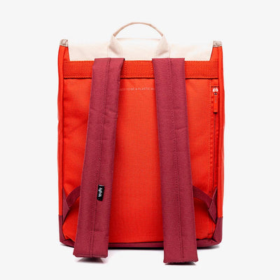 
                    
                      Kaut backpack, Cherry Block Oxford RPET fabric, back view showing orange body, maroon shoulder straps, and beige top.
                    
                  