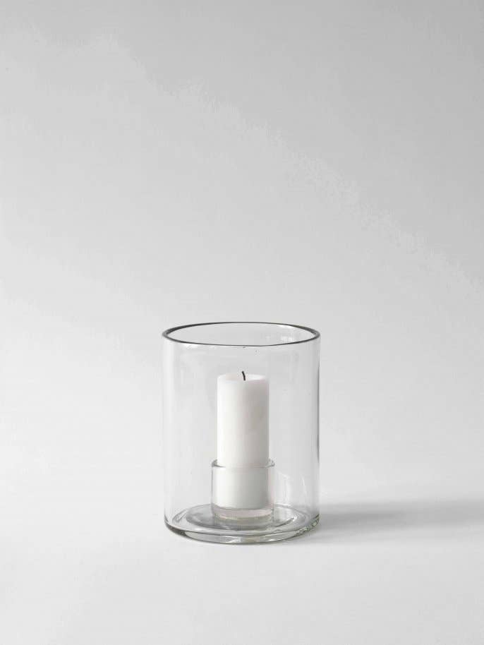 Luna candle holder, Small, clear recycled glass cylinder, with a white pillar candle.