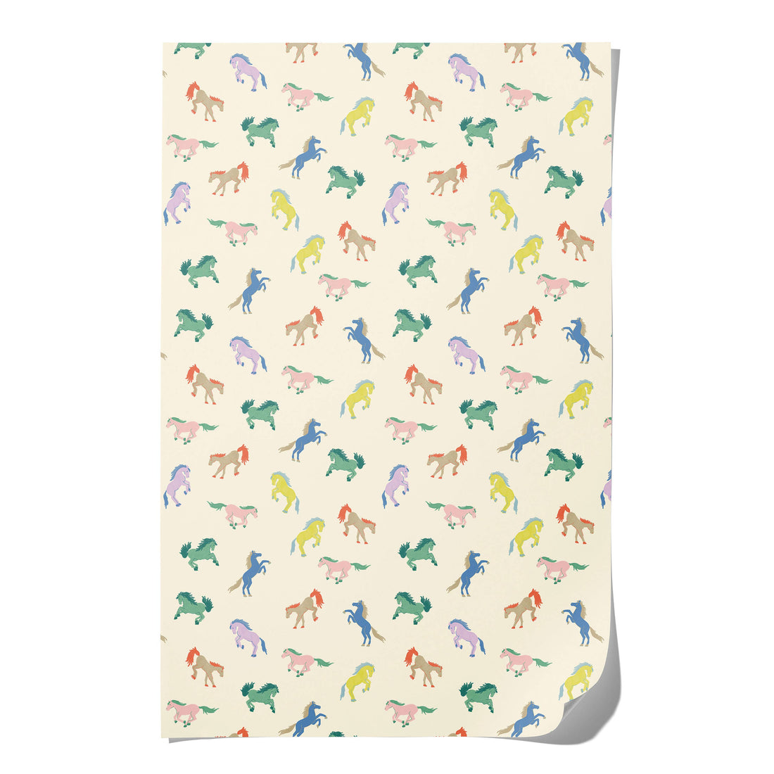 Wild Horses wrapping paper, full sheet displaying colorful pastel horse pattern on cream recycled paper, with a curled…