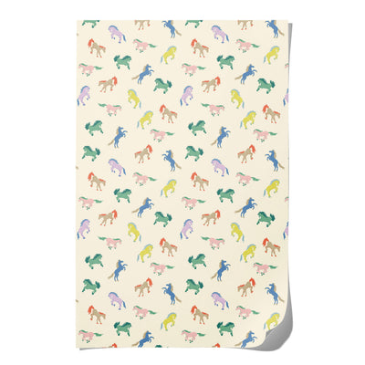 
                    
                      Wild Horses wrapping paper, full sheet displaying colorful pastel horse pattern on cream recycled paper, with a curled…
                    
                  