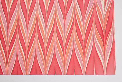 
                    
                      Candy Stripes Sugar Spice hand marbled wrapping paper, close-up detail of pink, peach, and cream wavy stripes on recycled…
                    
                  