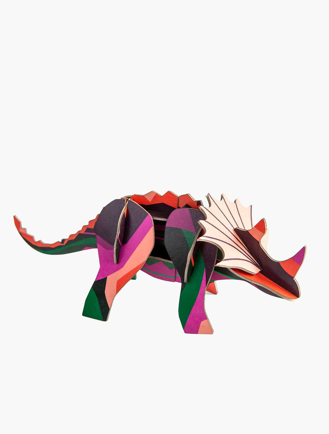 Studio Roof 3D Triceratops model kit, colorful abstract geometric pattern on recycled cardboard, front side view on white.
